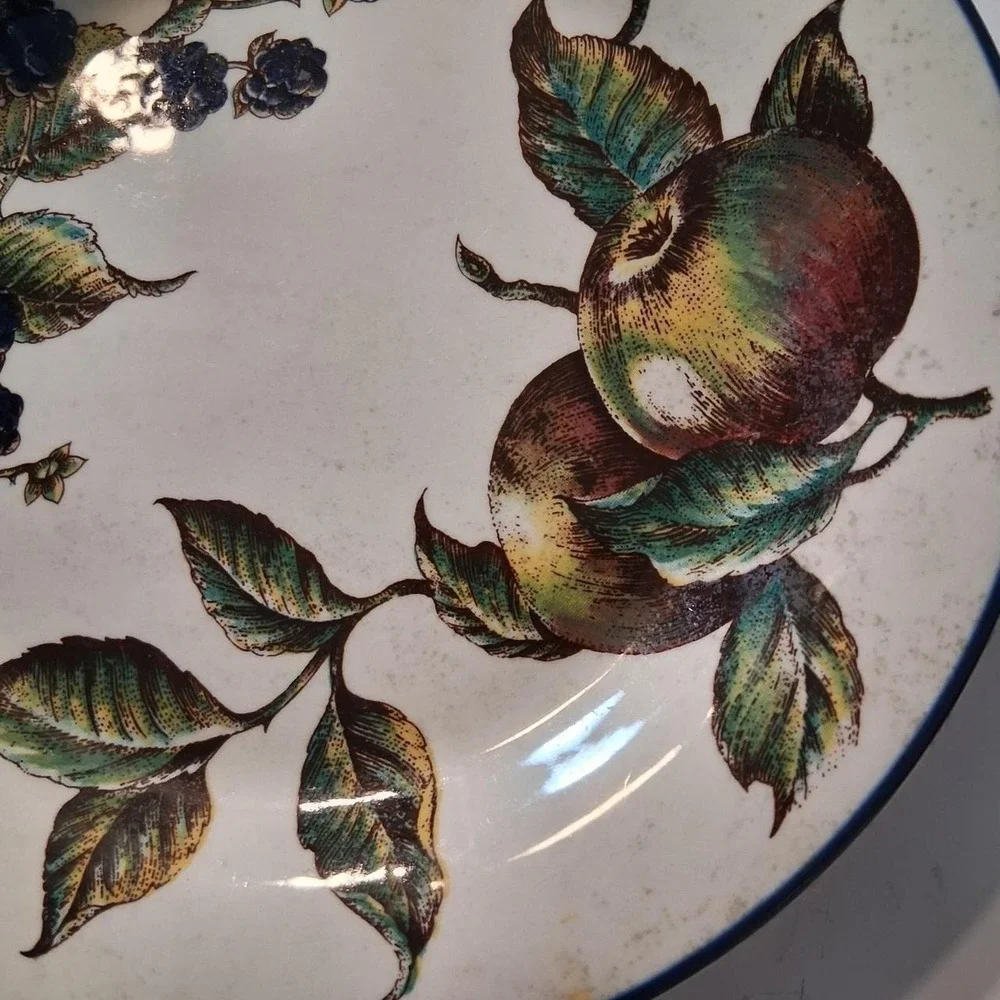 Vintage fruit plate with apples and blackberries